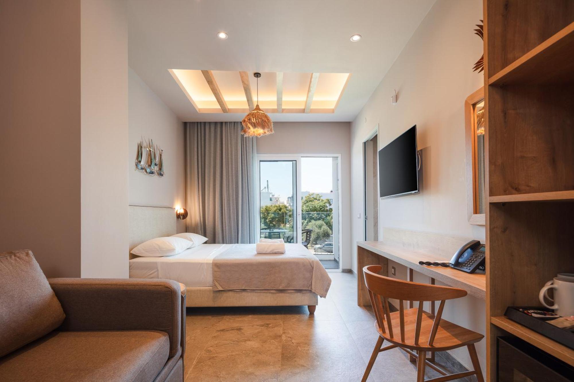 Skipper Beachfront Suites แอร์ซอนิสซอส ห้อง รูปภาพ