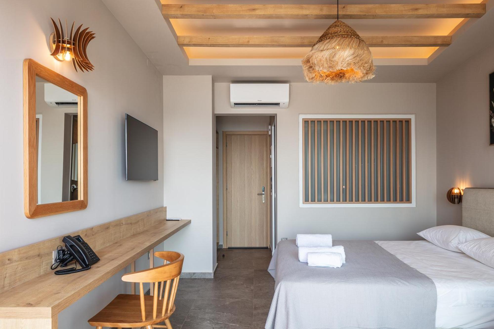 Skipper Beachfront Suites แอร์ซอนิสซอส ห้อง รูปภาพ