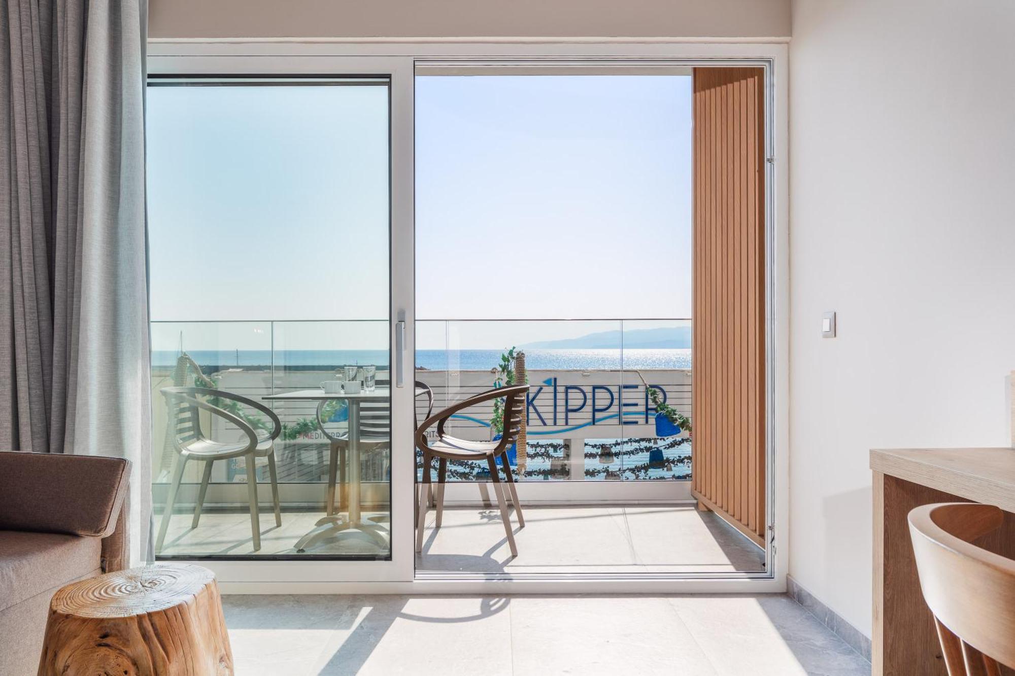 Skipper Beachfront Suites แอร์ซอนิสซอส ห้อง รูปภาพ