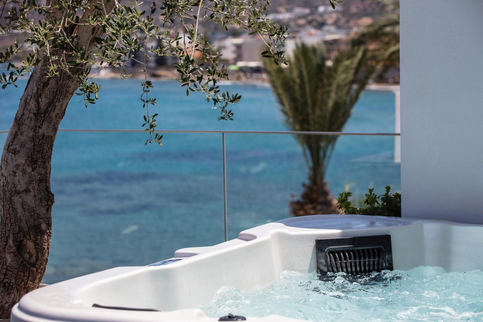 Skipper Beachfront Suites แอร์ซอนิสซอส ภายนอก รูปภาพ